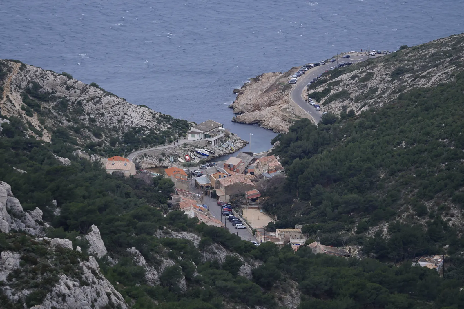 Fishermen's cabanons in a calanque