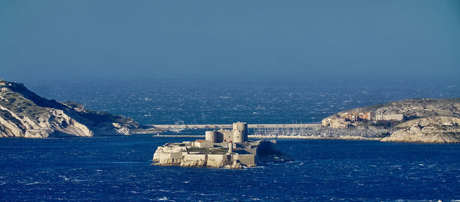 The Château d'If seen from the boat with the islands behind