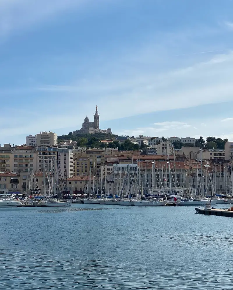 The Vieux-Port, the natural harbour where the Greek founders landed, with Notre-Dame de la Garde above